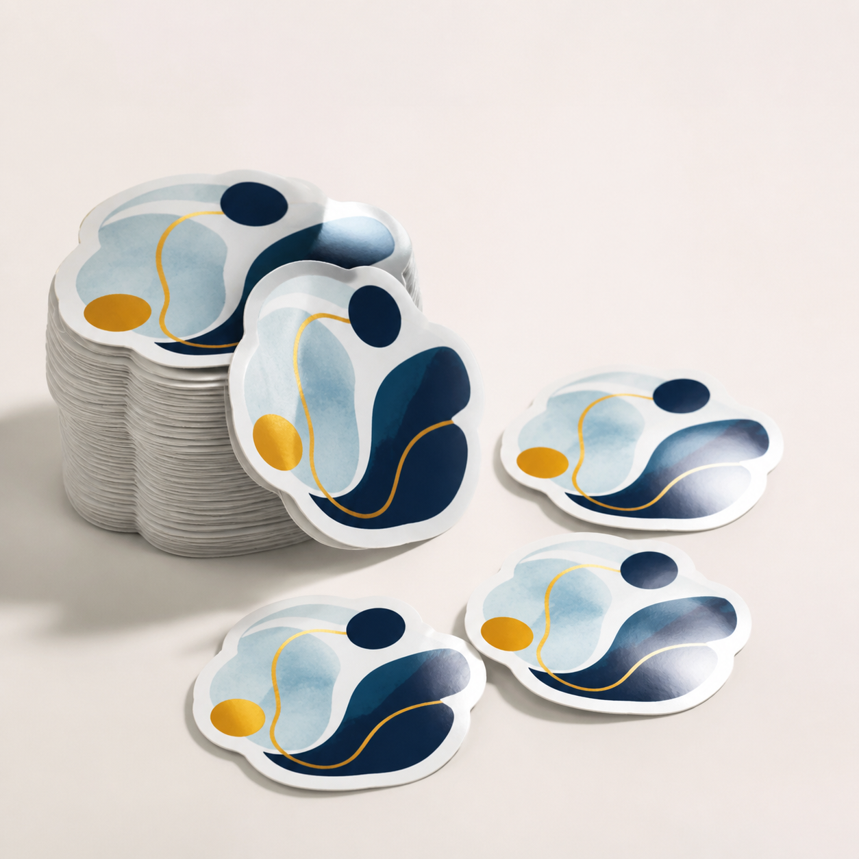 One hundred matching two-inch gloss vinyl stickers shown as a small custom production run