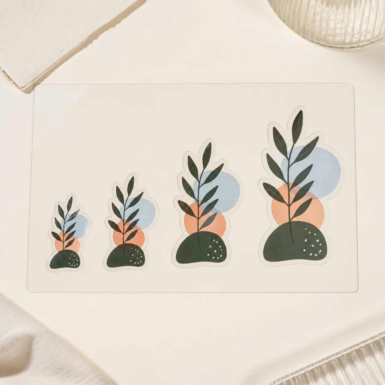 Four matching transfer artwork examples increasing from compact to large