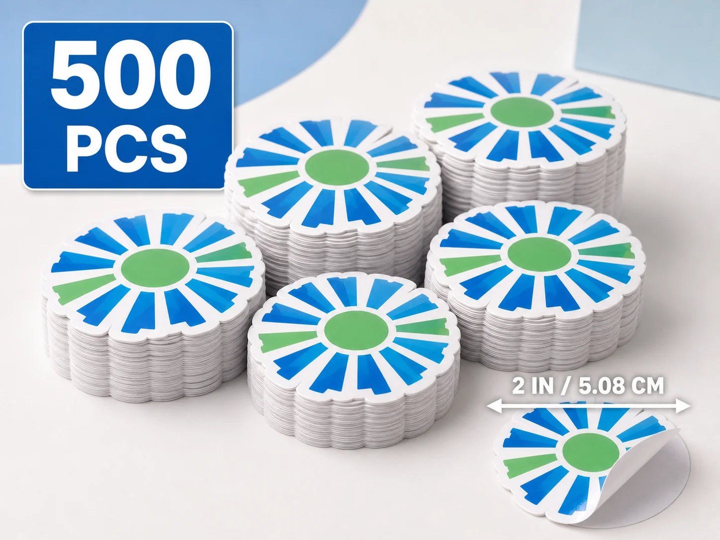 Five hundred identical gloss vinyl stickers shown in stacks, with one sticker shown at the maximum 2-inch or 5.08-centimeter size