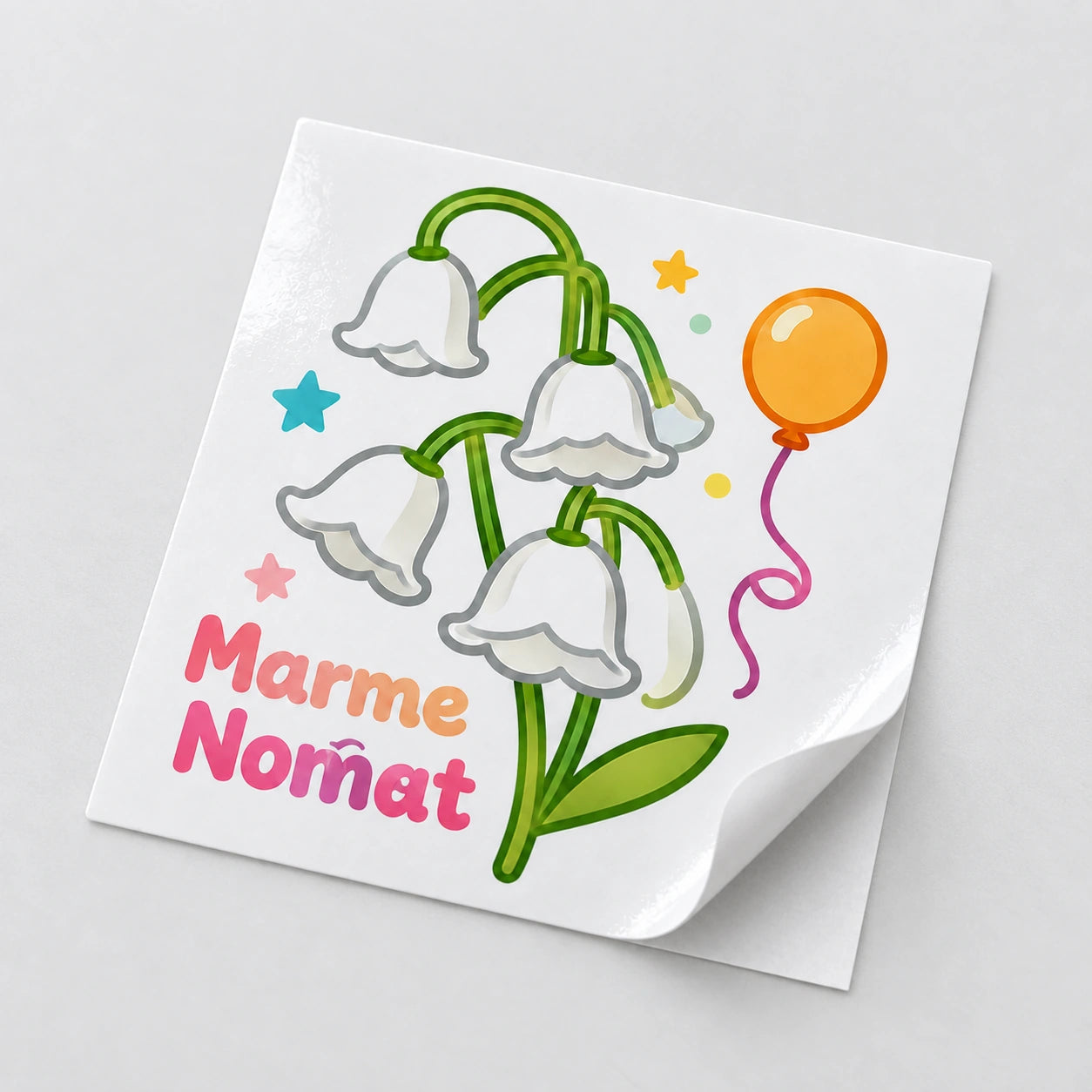 Square floral gloss vinyl sticker lifting from a white release liner