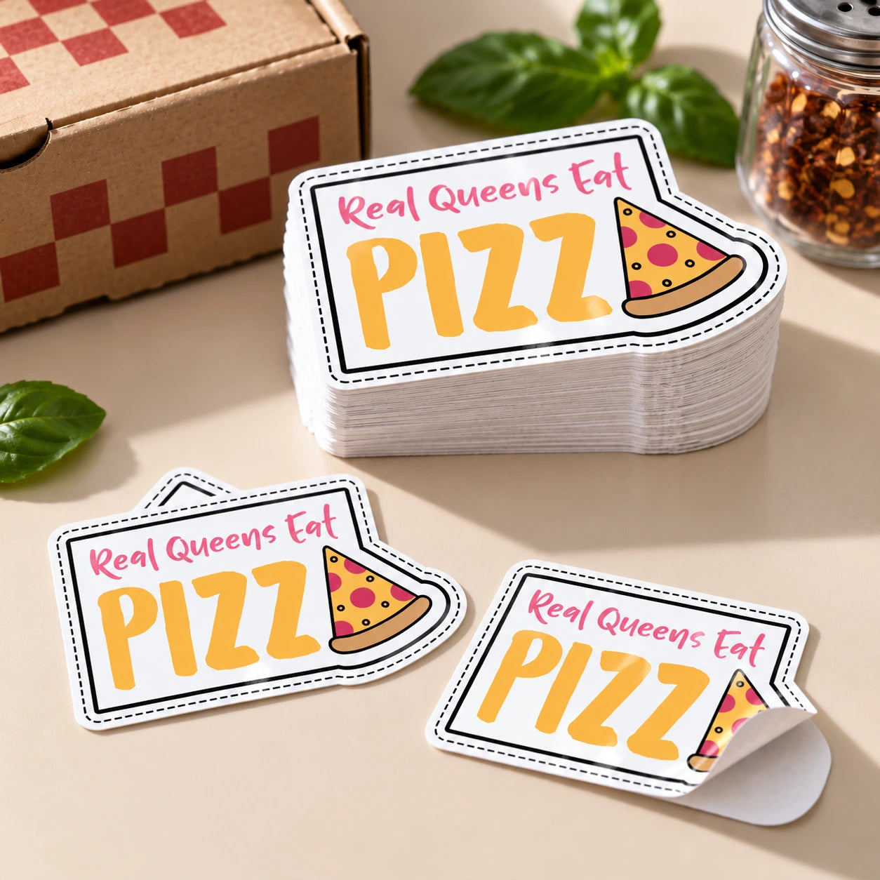 Illustrative batch of pizza-themed gloss vinyl stickers with loose samples and a lifted corner